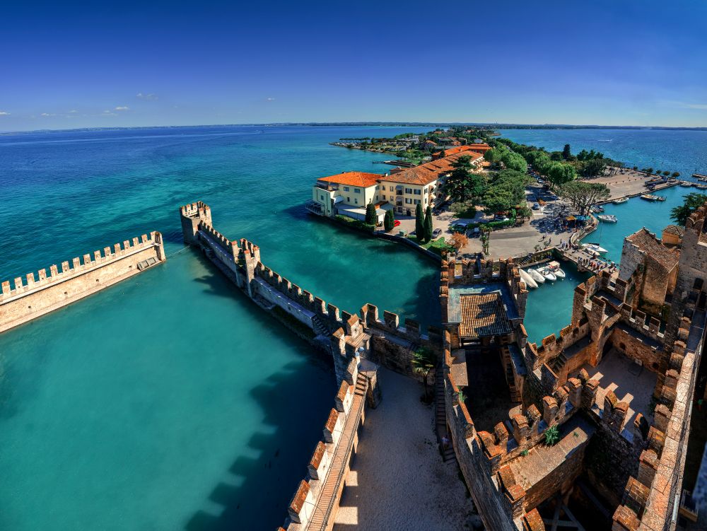 Panoramic aerial view on historical town Sirmione on peninsula in Garda lake, Lombardy, Italy