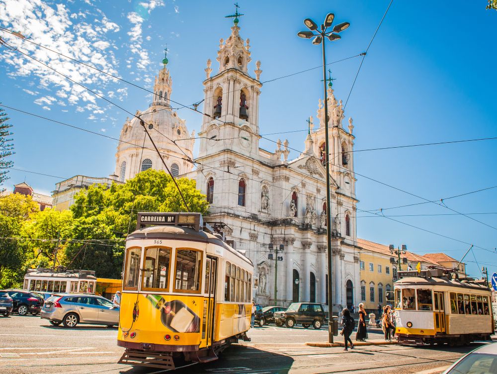 Yellow tram 28 on streets of Lisbon, Portugal