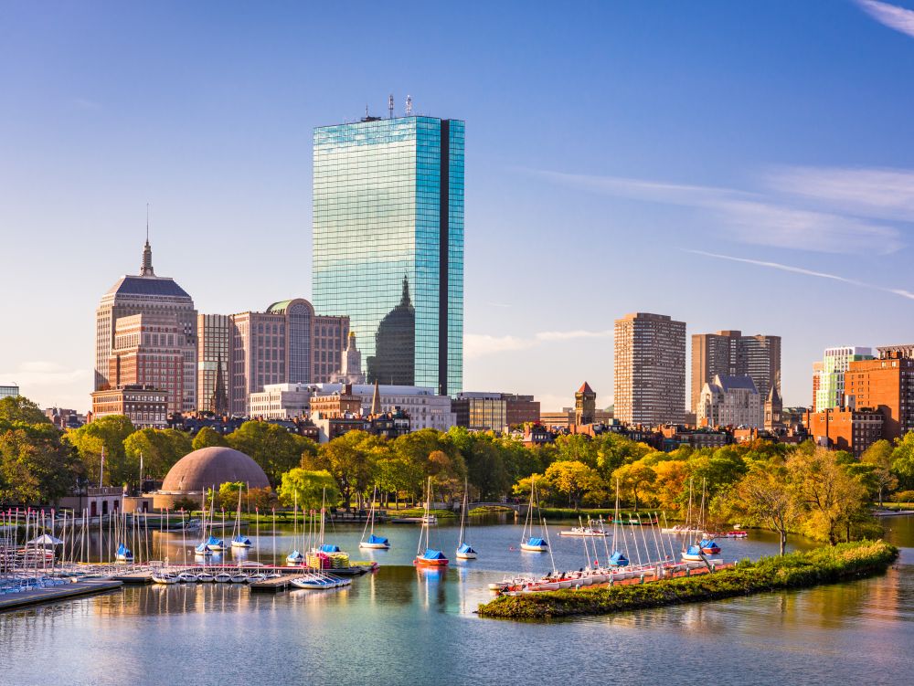 Boston, Massachusetts, USA city skyline on the river.