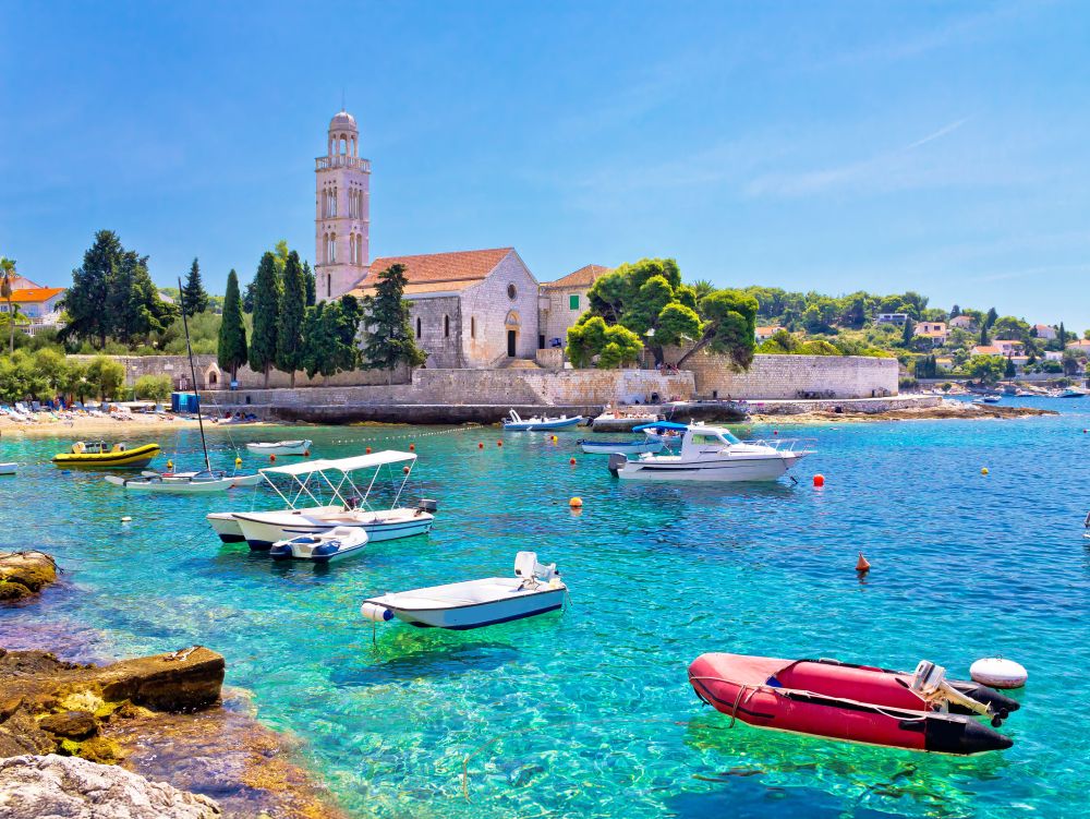 Turquoise sea of Hvar island, franciscian monastery view in Dalmatia, Croatia