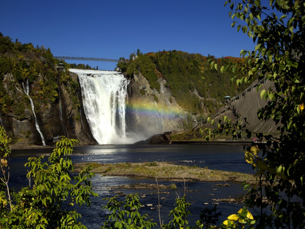 Montmorency waterfall with rainbow in Quebec, Canada