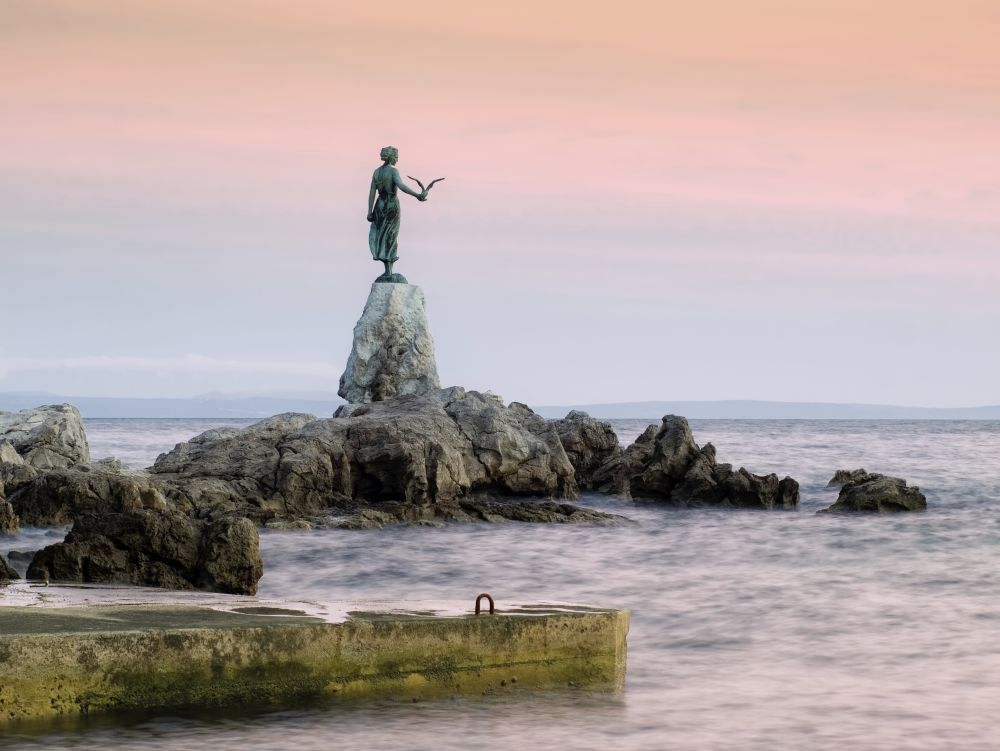 This historic statue on the Adriatic coast is a symbol of touristic town Opatija in Croatia.