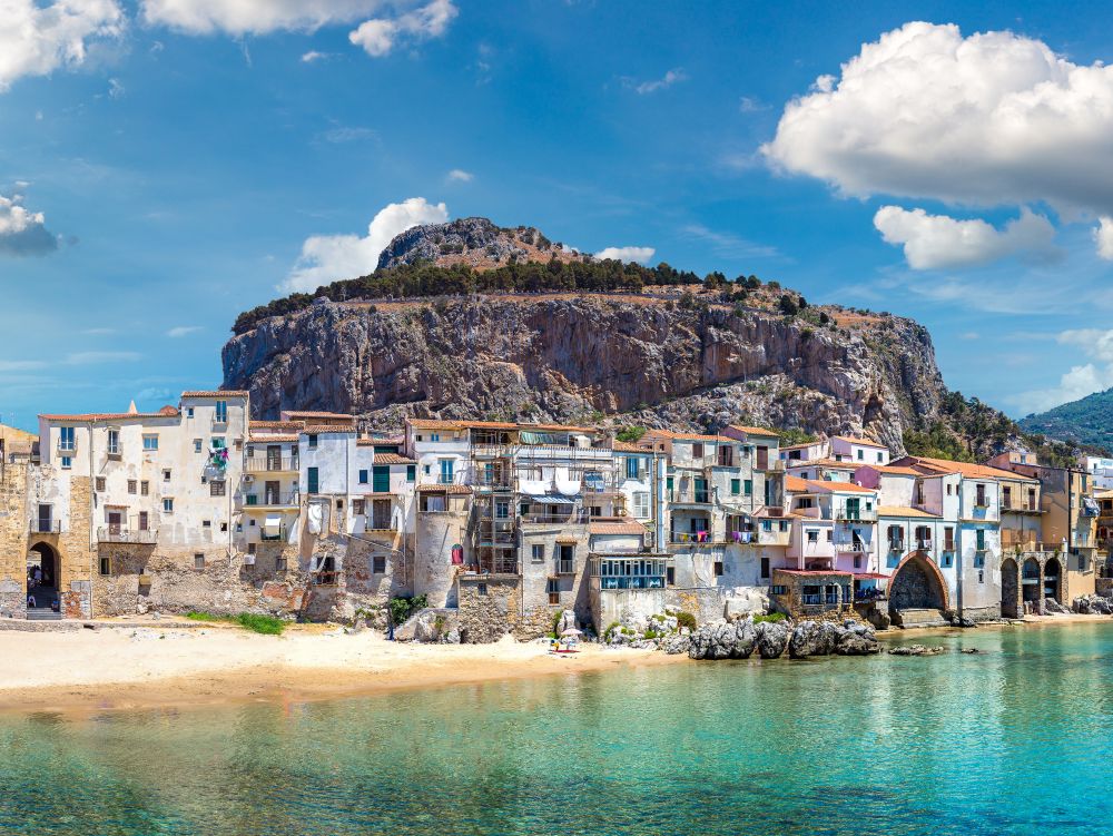 Panorama of Harbor and old houses in Cefalu in Sicily,