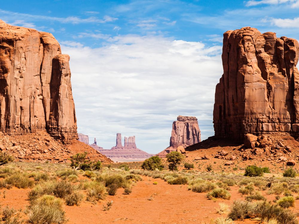 Complementary colours blue and orange in this iconic view of Monument Valley, USA