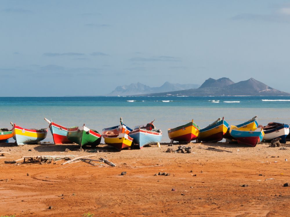 Fishing boats rest in Mindelo beach.
